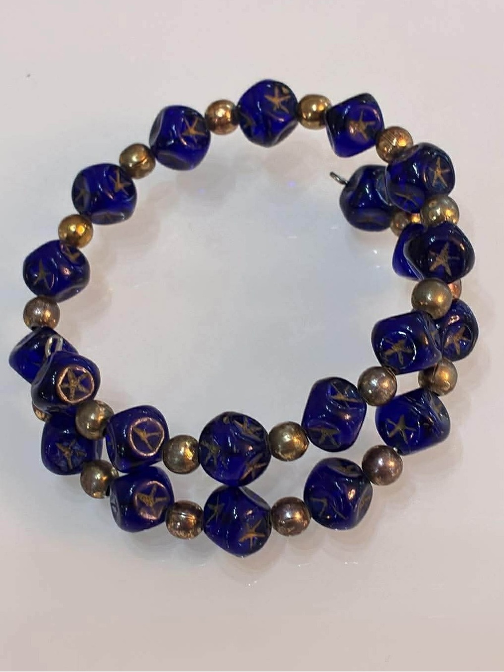 Handcrafted Blue Glass Bead Bracelet with Gold Accents